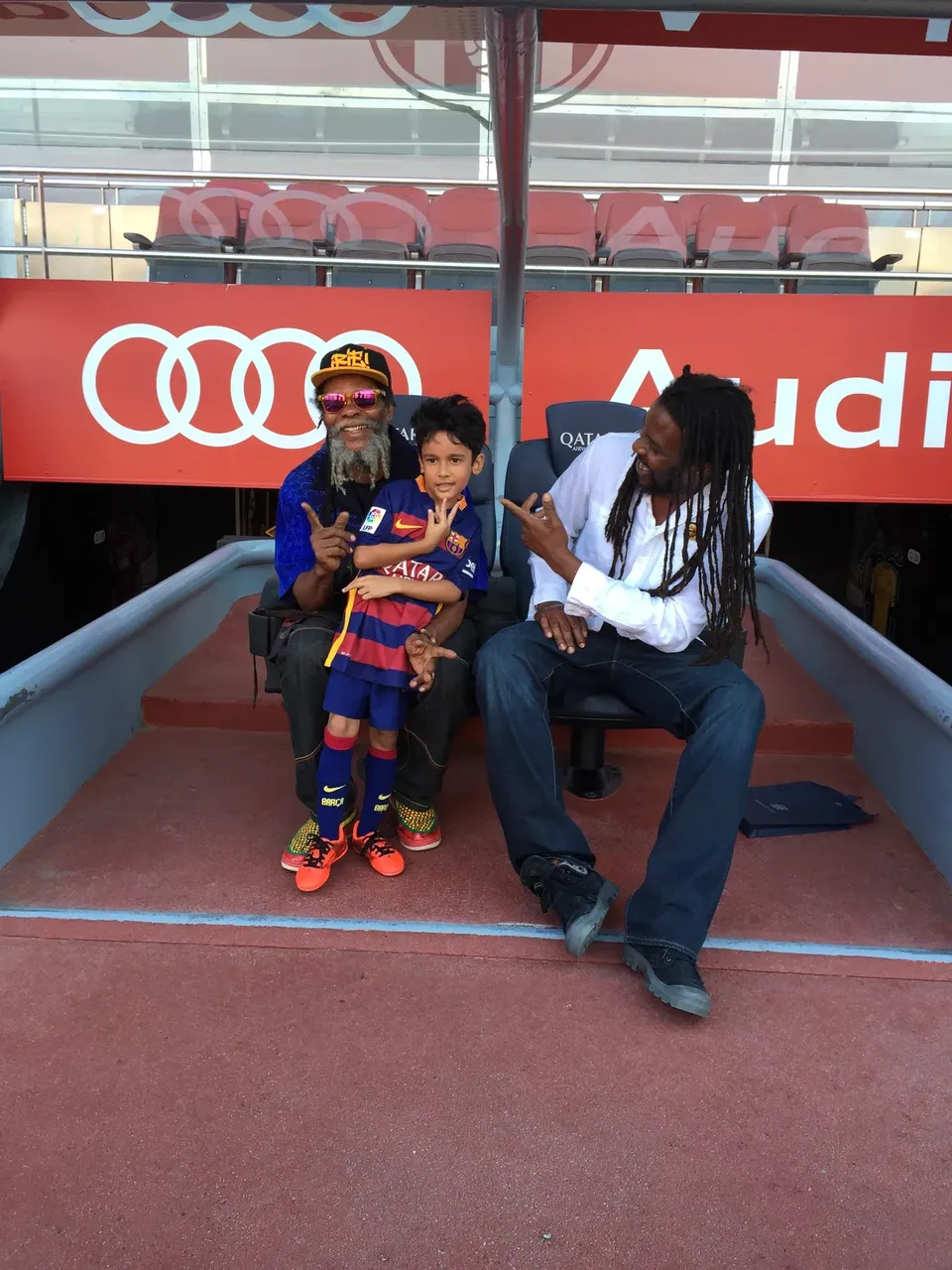 Flagman Judah, Jr. Gong and his son, Elijah, in the great Barcelona stadium, 2017. More light and energy young star. Life Journey, Rastaman Passing By.