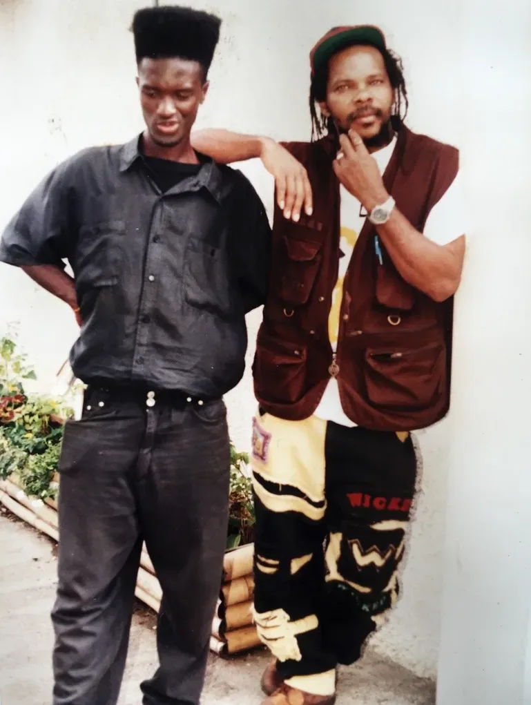 Two of my artists dem that I record in the early 90s, Blackout JA and Presley. Young great stars coming up. I record two album with them, one named ‘Blackout JA’ with Blackout and one called ‘African Swim’ with Presley, and I record many …